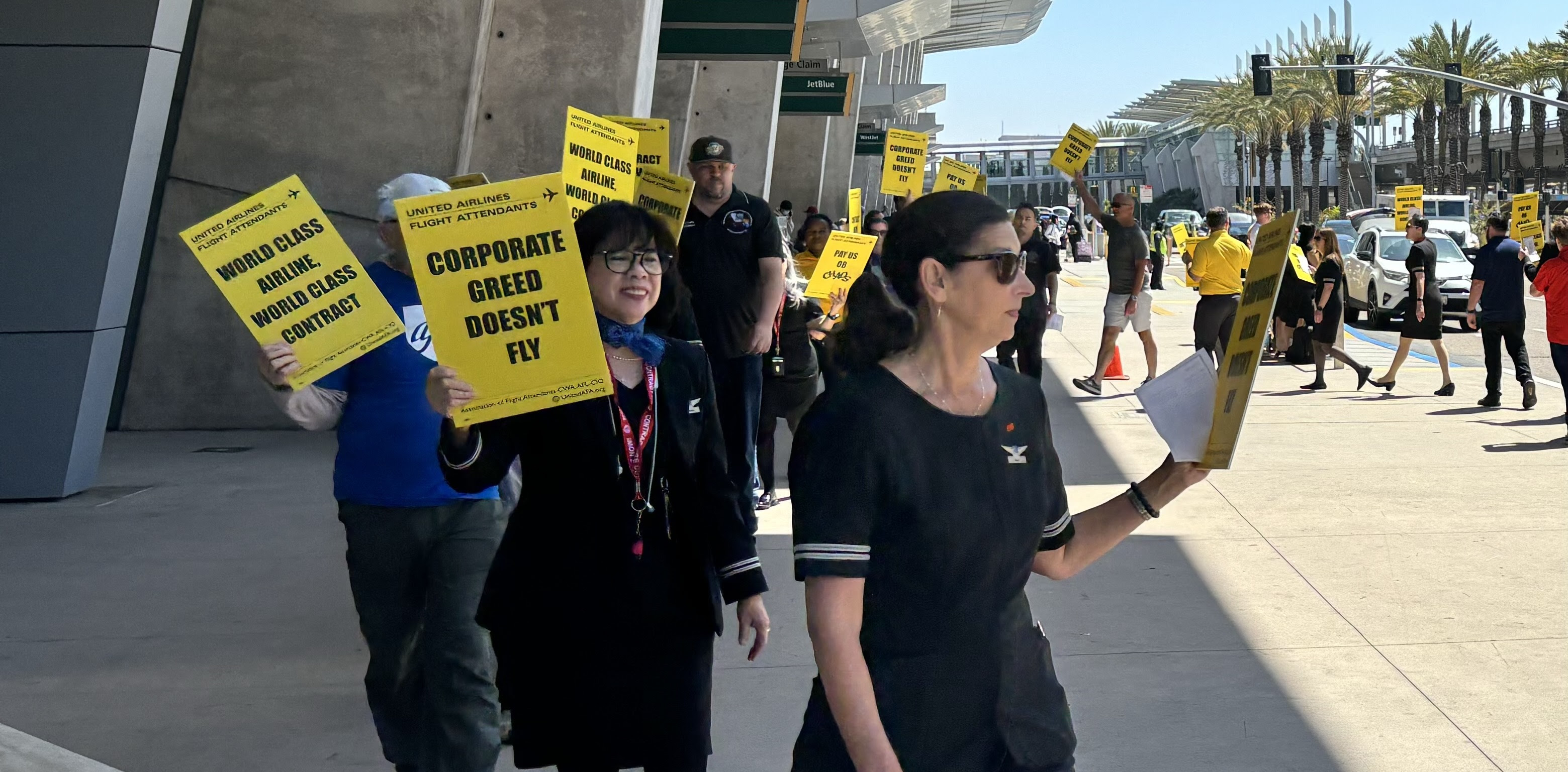 United Flight Attendants Picket For Improved Wages