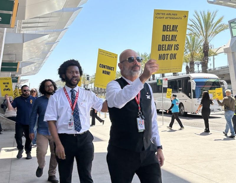 United Flight Attendants Picket For Improved Wages